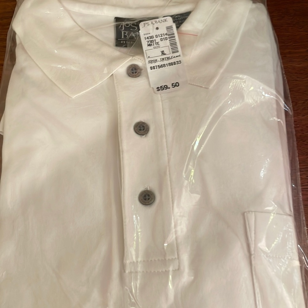 Brand new white polo shirt